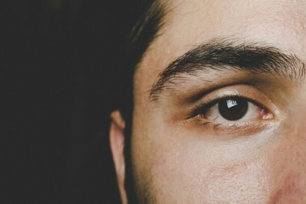 man partial face with eye